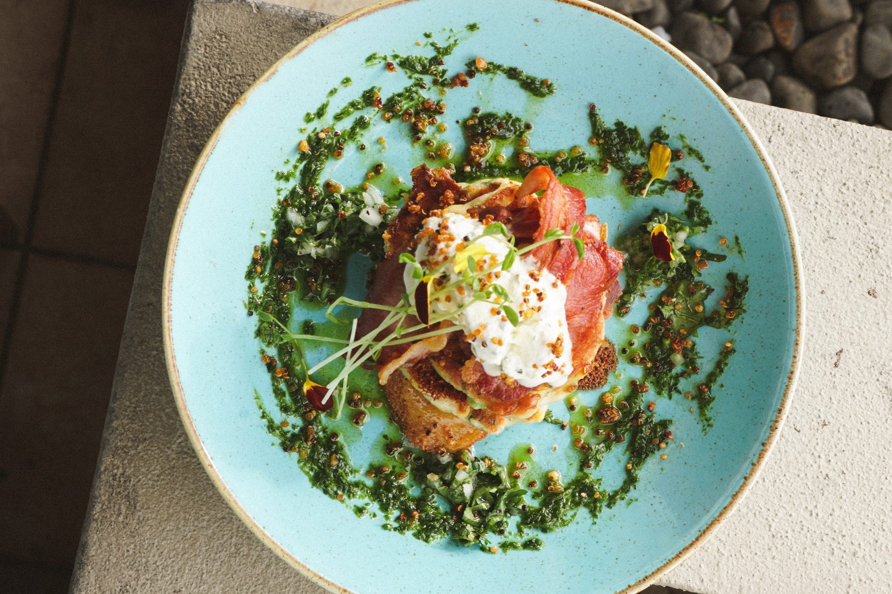 Corn fritters with bacon and chimichurri