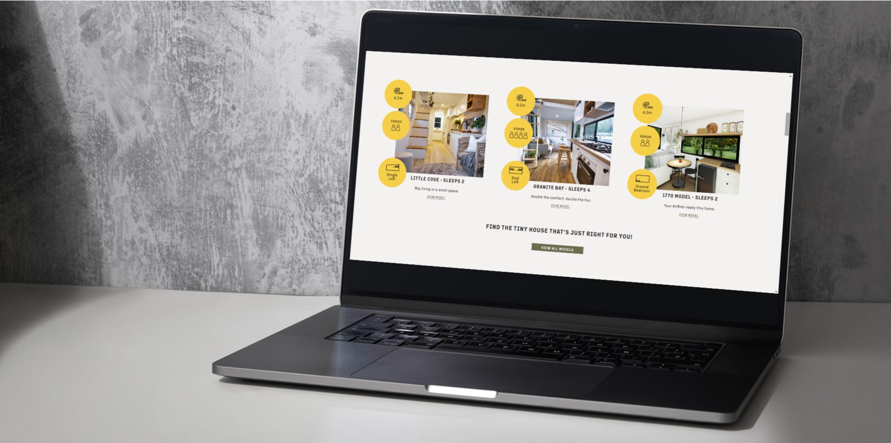 Model pages with the yellow icons on a laptop